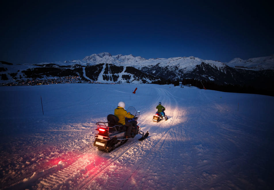 Les Saisies snow mobiles at night